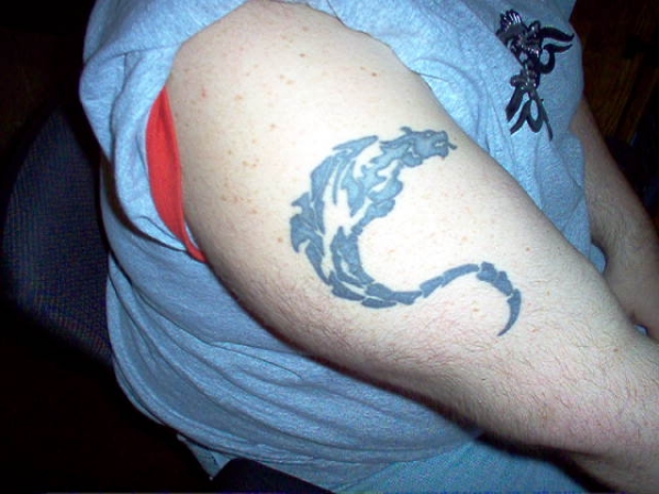 Arm dragon tattoo