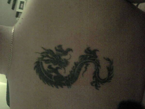 my back stabbing tattoo