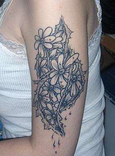 Daisies tattoo