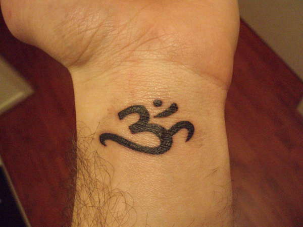 Ohm on my wrist tattoo