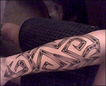 Forearm Tribal sleeve tattoo