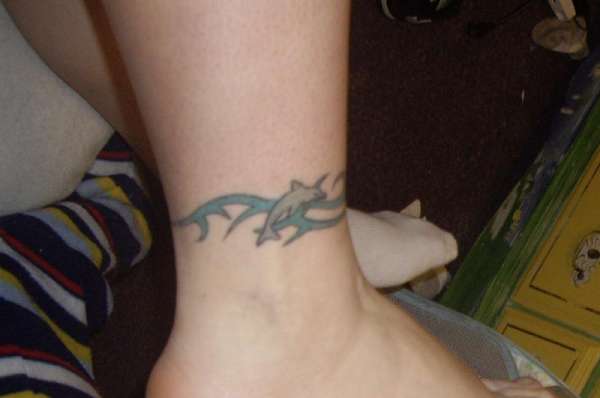 tattoo pictures of ocean waves with dolphin