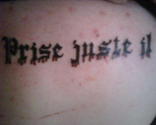 "Just Take It" in French tattoo