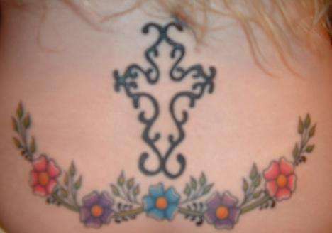 Tramp Stamp Cross/Flowers tattoo