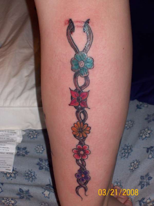 ribbon of flowers on my wifey tattoo