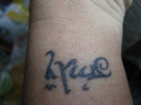 Elfic characters tattoo