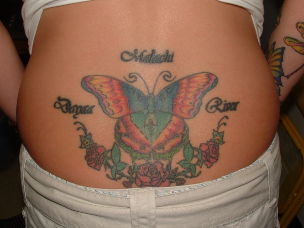 butterfly w/ roses tattoo