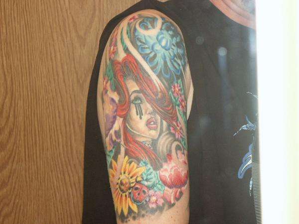 Left Arm tattoo