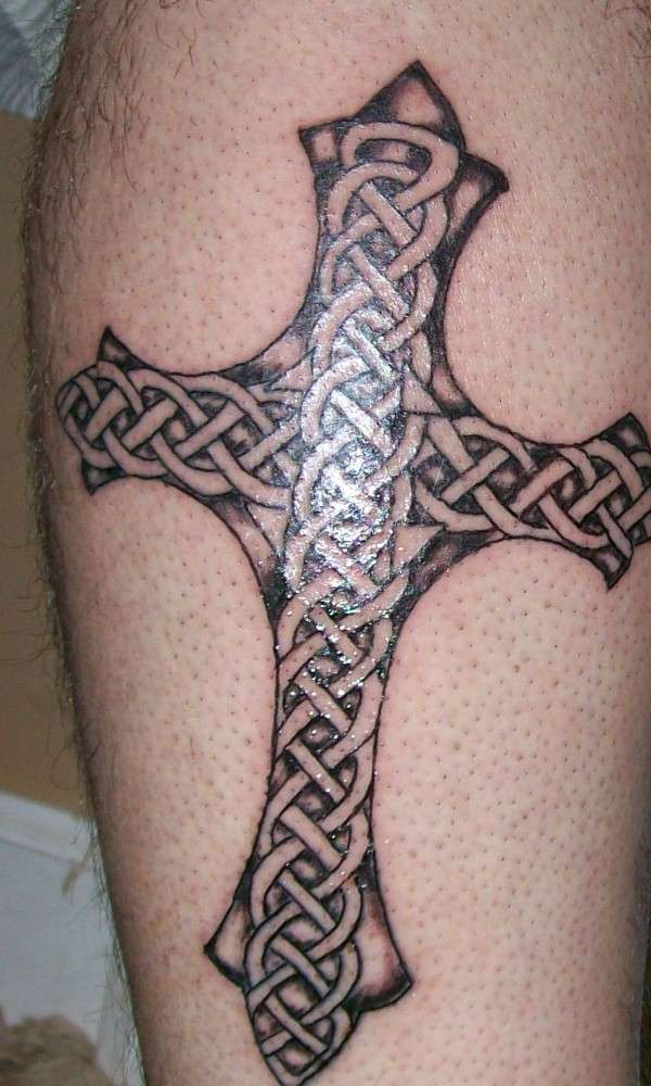 CrOss On LeG tattoo