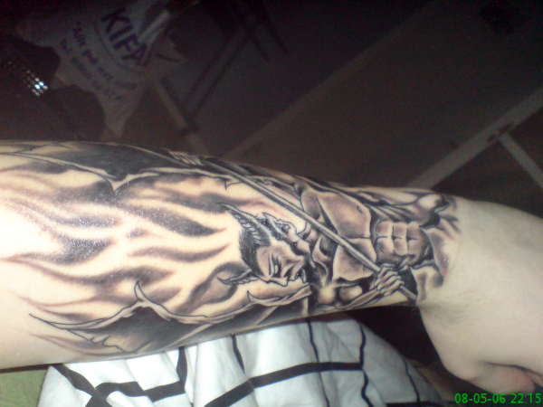 Devil rising tattoo