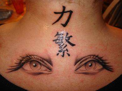 Kanji and eyes tattoo