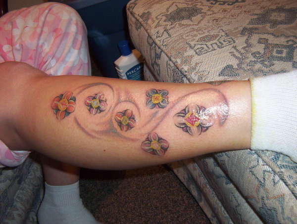 Leg Flowers tattoo