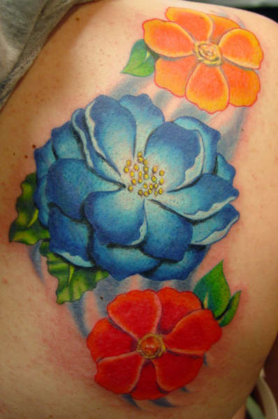 Flower cover up tattoo