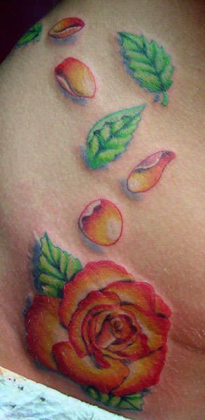 Rose and petals tattoo