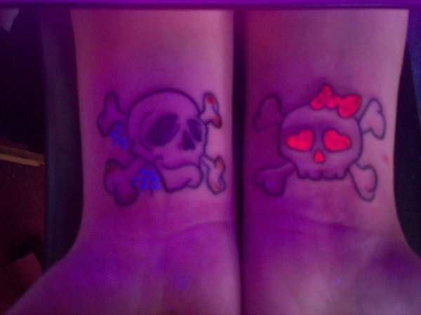 UV skulls tattoo