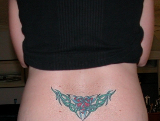 Grass Triskle - Lower Back tattoo