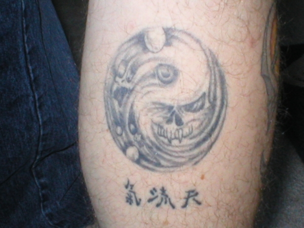 skull whirlpool tattoo