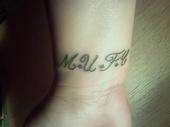 M U F C tattoo