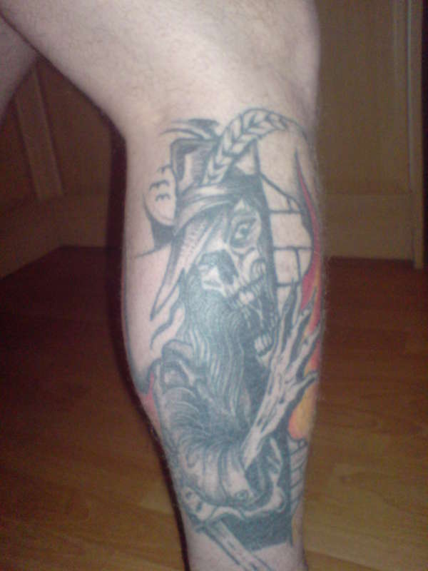 evil skeleton tattoo