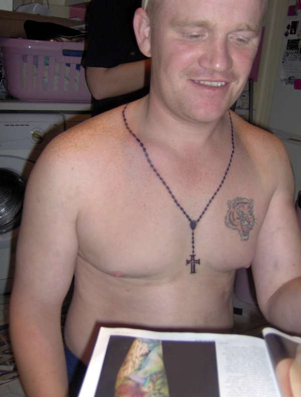 rosary beads. tattoo