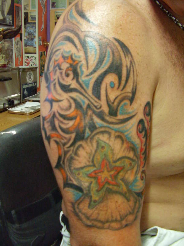 sea horse with star tattoo