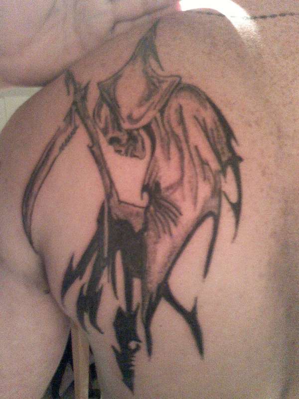 the grim reaper on my bro! tattoo
