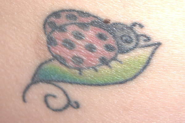 lady bug tattoo