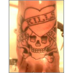 Ed Hardys Love Kills Slowly by David @ Anchors Aweigh tattoo