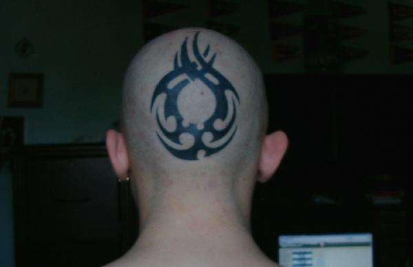 Back of head, tribal tattoo