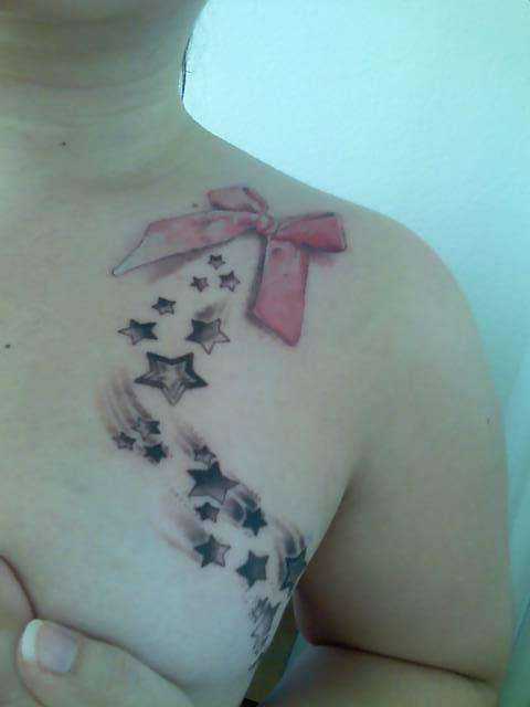 bow and stars tattoo