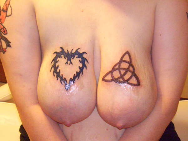 TATS ON TITS tattoo