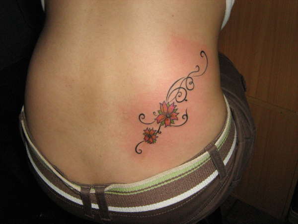 flower on ur back...tatz done by st.angel78 tattoo