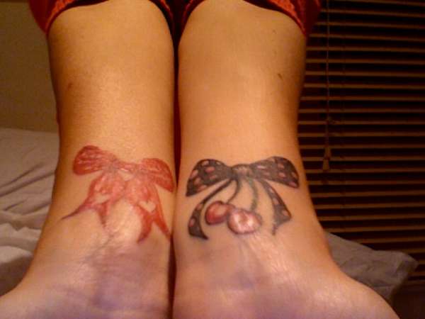 Bows on my wrists tattoo