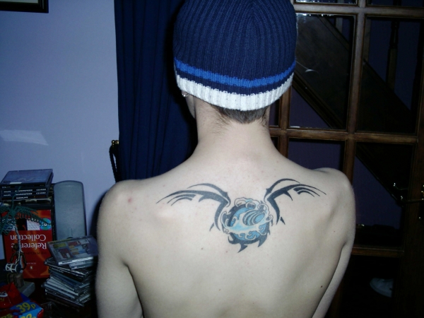 Wave 'N' Wings tattoo