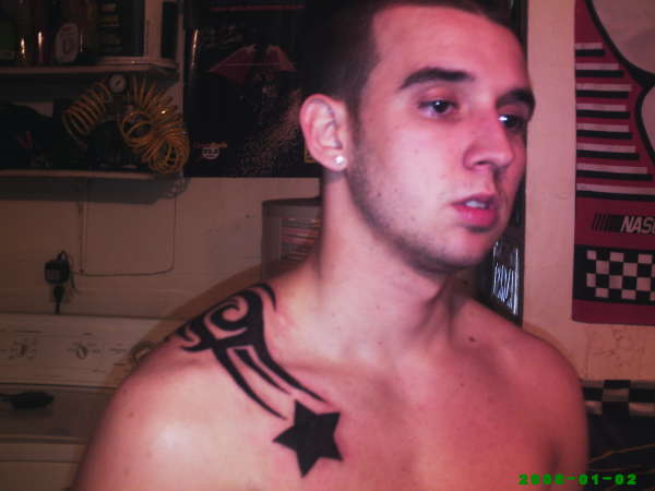 justin first piece tattoo