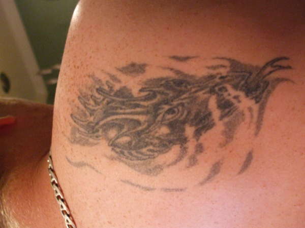 smokey dragon tattoo