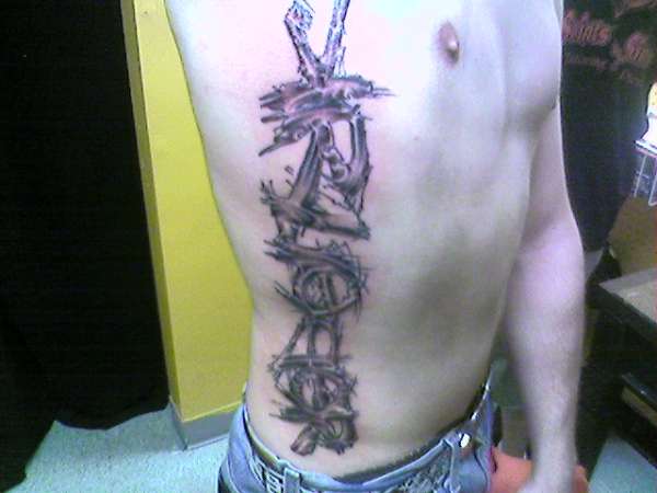 last name rib tat tattoo