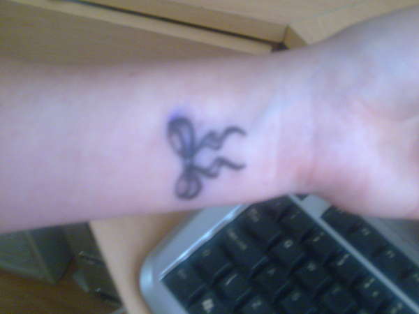 Bow on Wrist - newly done tattoo