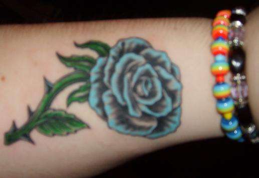 Roses are... blue? tattoo