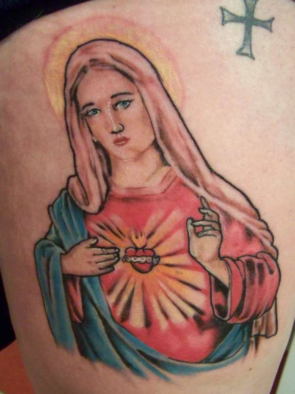 Virgin Mary tattoo.