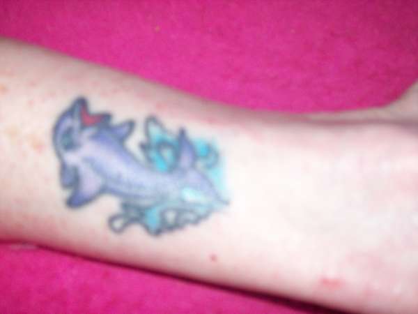 Dolphin on Ankle tattoo