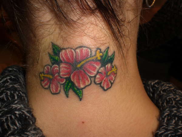 Flowers on neck tattoo