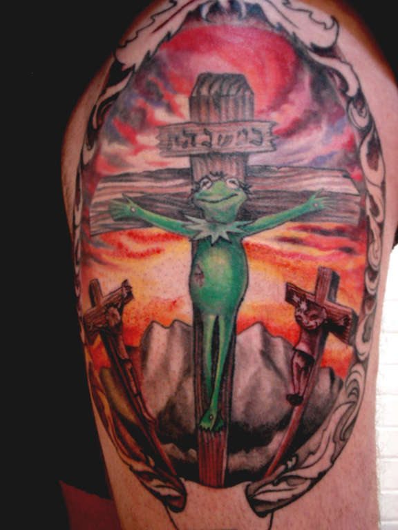 Kermie on a cross tattoo