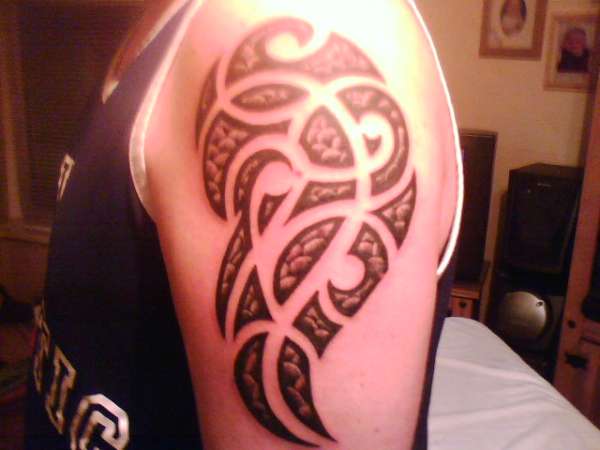 Unusual peice of Tribal tattoo