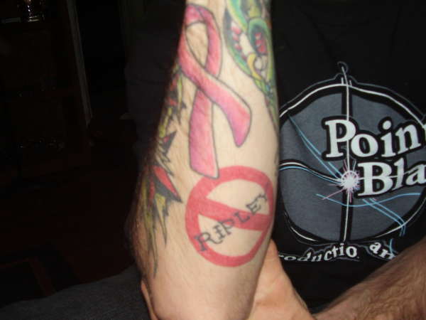 NO ripley with pink ribbon tattoo