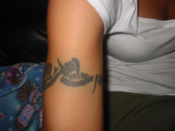 Arm band (tribal) tattoo