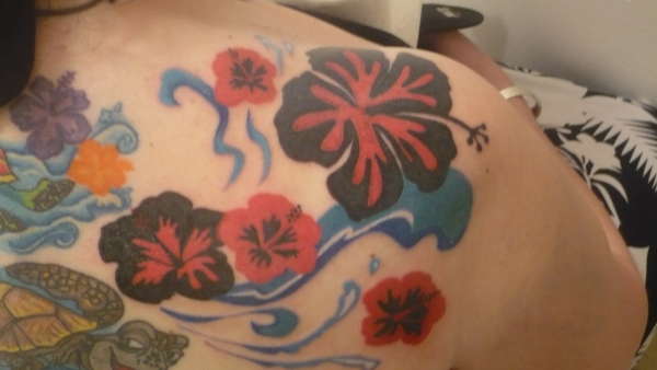 Continuation of back piece tattoo
