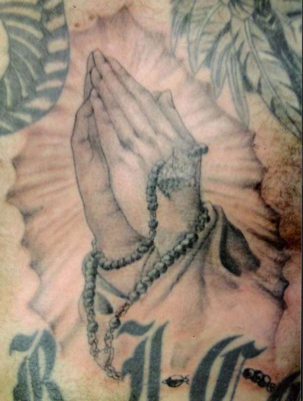 praying hands tattoo