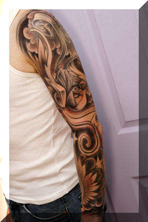 Swallow sleeve tattoo