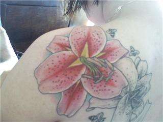 Lilly in color tattoo